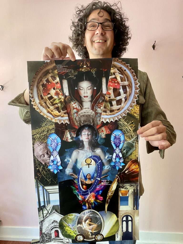 Adult student standing, holding his finished collage art.